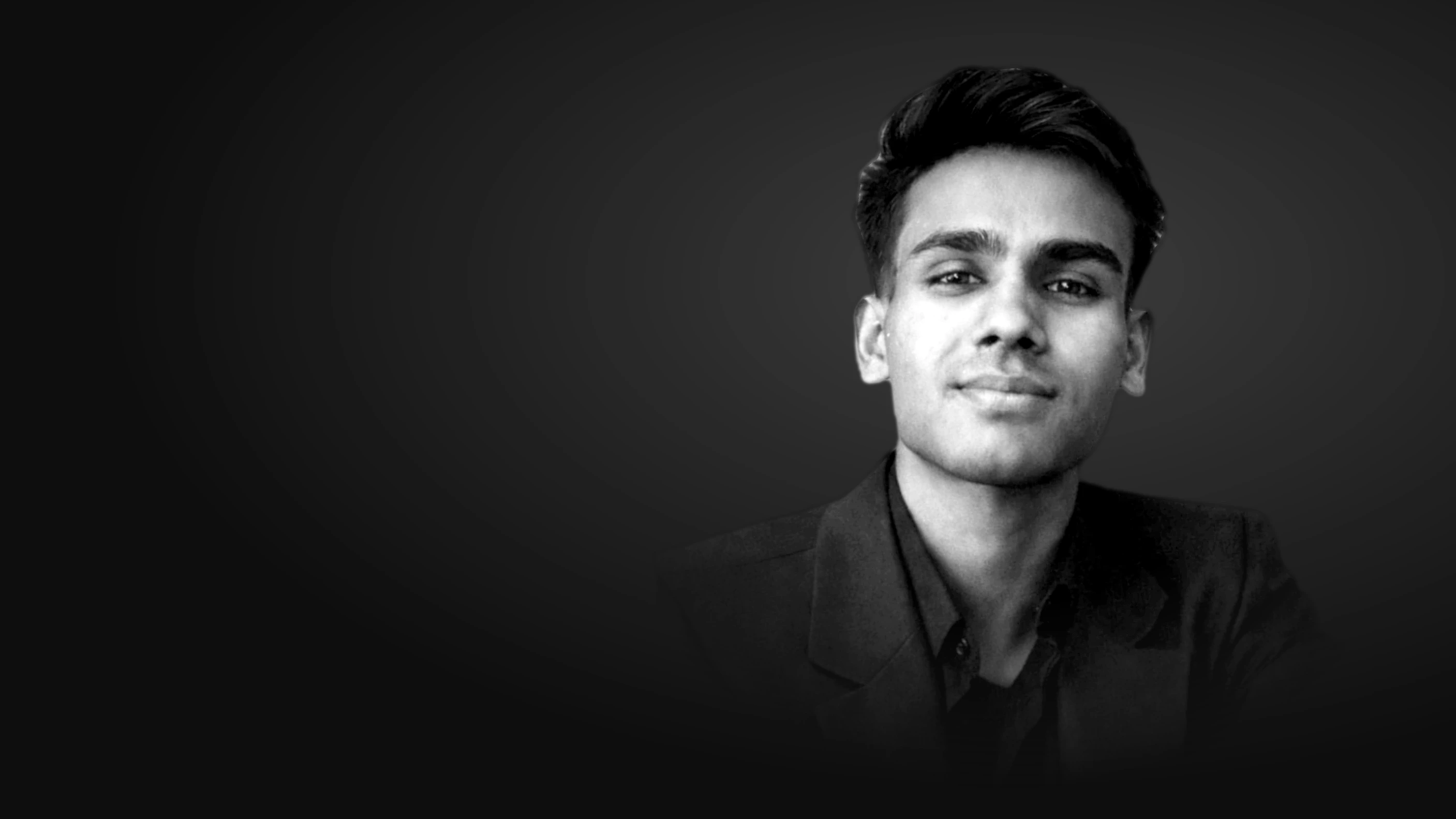 Black and white portrait of Suyash Singh.