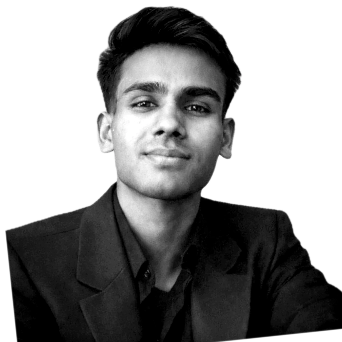 Black and white portrait of Suyash Singh in a dark blazer.